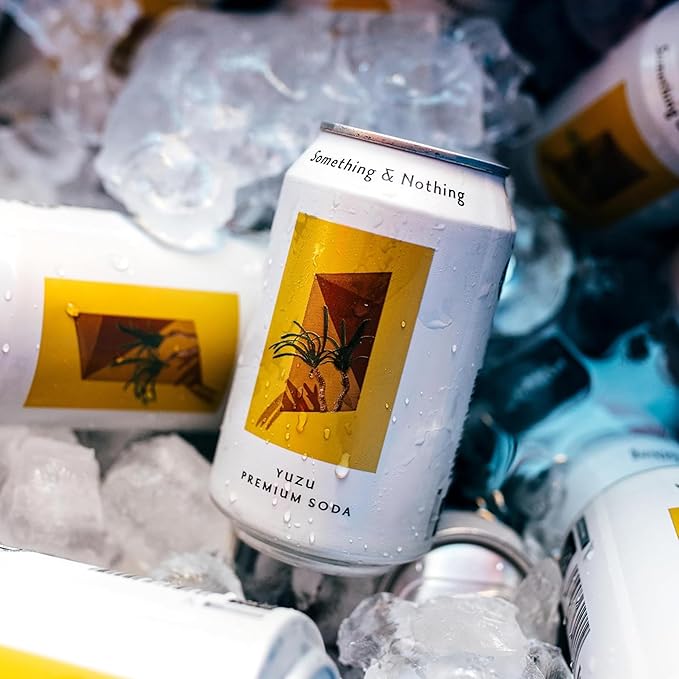Something &amp Nothing Yuzu Flavoured Sparkling Water | Lightly Carbonated Full Flavoured with Added Grape &amp Lemon Juice | Vegan &amp Low Calorie Soda | 12 Fl Oz Cans (Pack of 12)
