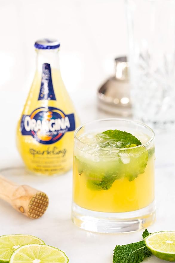 Orangina - Citrus Sparkling Juice Beverage - Light Pulp - Original Imported European French Recipe - No Artificial Ingredients - (Pack of 12) (8.5 oz Bottle)