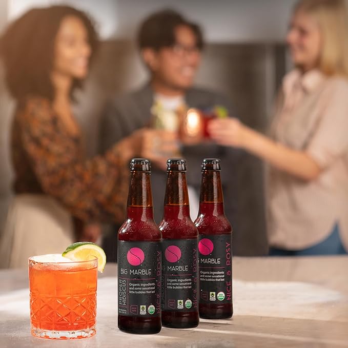 Big Marble Organic Proper Hibiscus Premium Non-Alcoholic Low Sugar Floral &amp Tart Fair Trade Certified Real Hibiscus No Artificial Sweeteners/Colors for Cocktails &amp Mocktails - 12 Pack