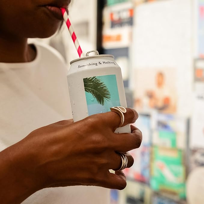 Something &amp Nothing Flavoured Sparkling Water - Lightly Carbonated Full Flavoured with Added Grape &amp Lemon Juice | Vegan &amp Low Calorie Soda | 355ml Cans Pack of 12 (Cucumber)